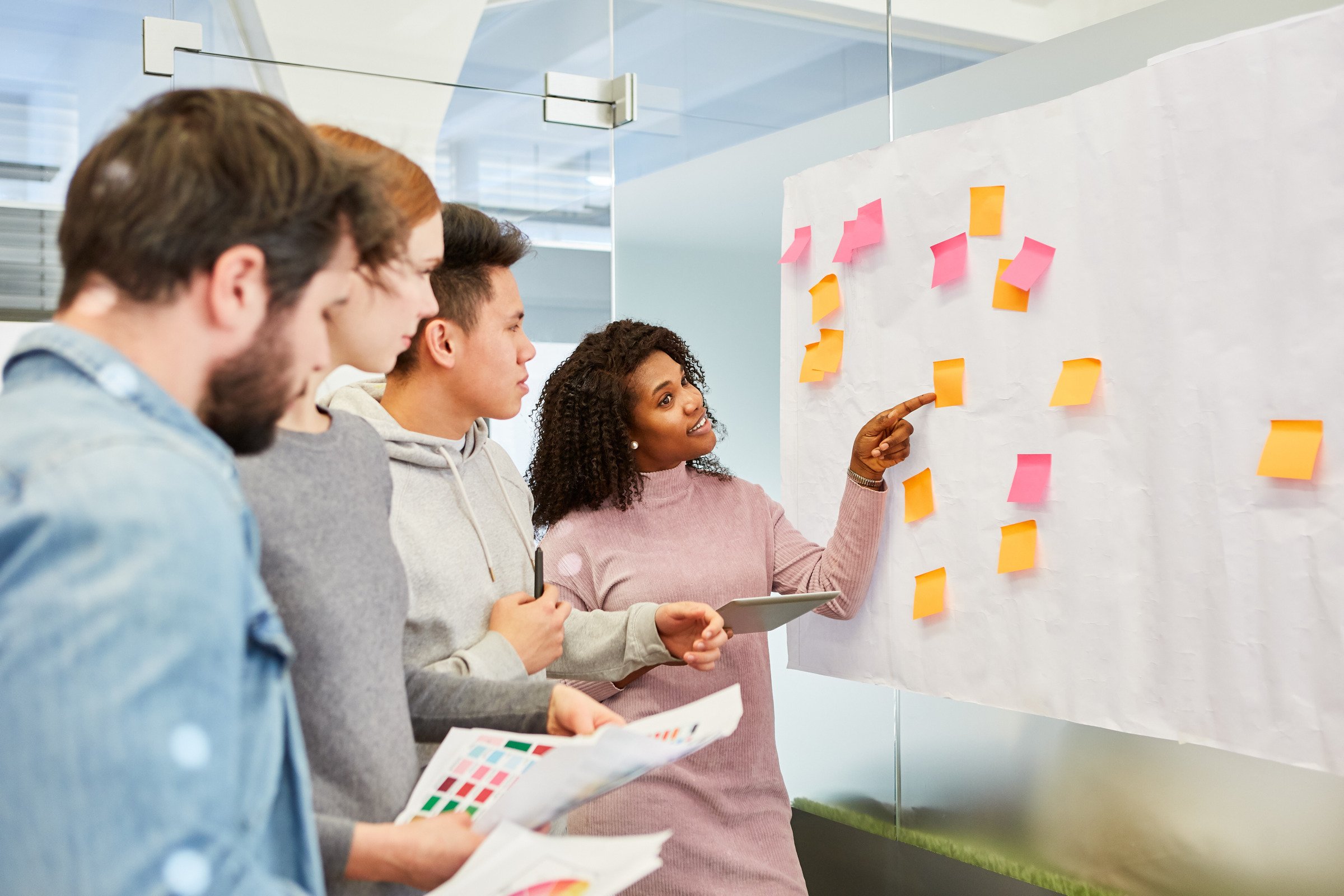 Team collaboration workshop with post-it notes — innovation accelerator design